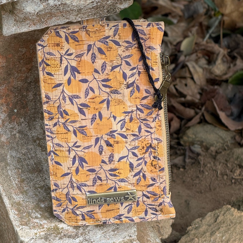 Cork Purse Pal with Lemon Print and blue leaves.